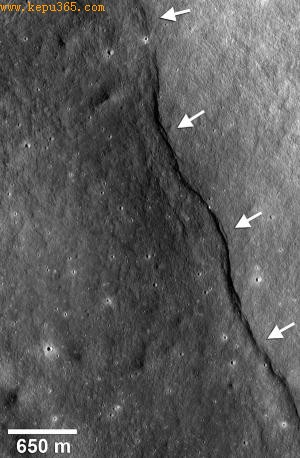 As the moon cooled and contracted, a thrust fault pushed its crust (arrows) up the side of an impact crater named Gregory (Image: NASA/GSFC/Arizona State University/Smithsonian)